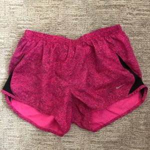 Pink nike lined athletic shorts.